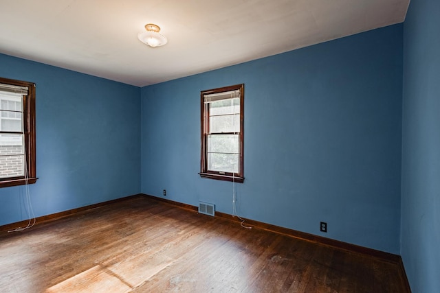 1223 S 3rd St, Saint Charles, IL 60174 - unfurnished room with wood-type flooring and baseboards