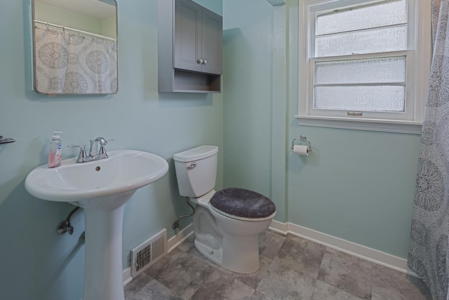 1223 S 3rd St, Saint Charles, IL 60174 - bathroom with toilet and baseboards