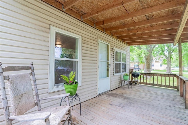 323 N 2nd Ave, Chenoa, IL 61726 - wooden terrace with a grill