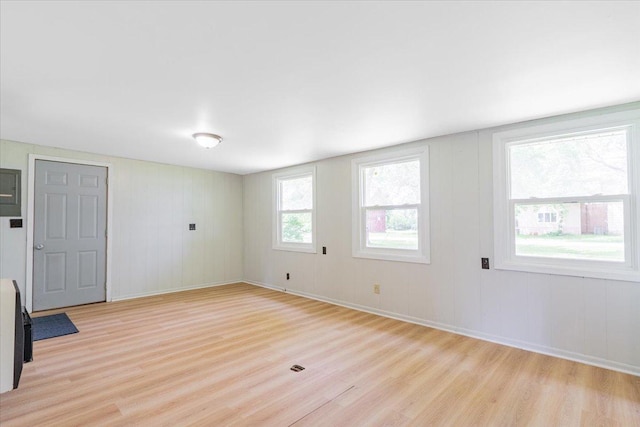 323 N 2nd Ave, Chenoa, IL 61726 - unfurnished room with light wood-type flooring and baseboards
