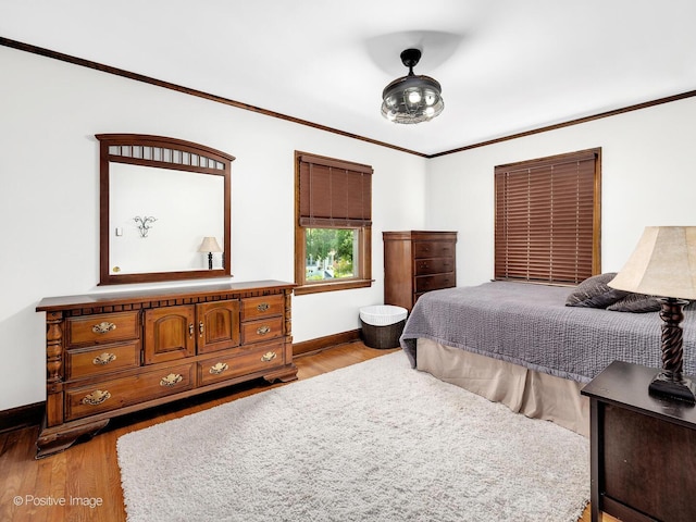 82 Northgate Rd, Riverside, IL 60546 - bedroom with light wood-type flooring, baseboards, and ornamental molding