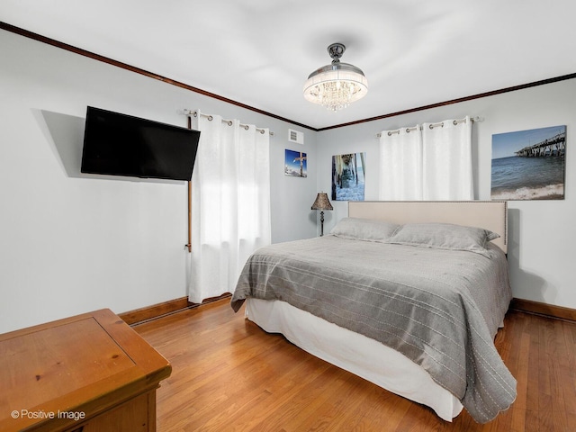 82 Northgate Rd, Riverside, IL 60546 - bedroom featuring baseboards, wood finished floors, a chandelier, and crown molding