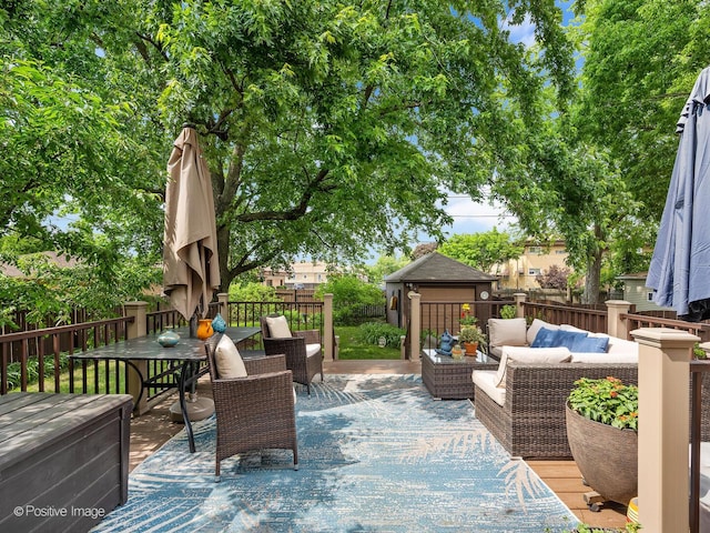 82 Northgate Rd, Riverside, IL 60546 - wooden deck with an outdoor hangout area, a fenced backyard, outdoor dining area, and an outdoor structure