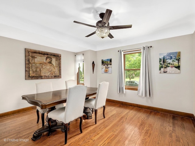 82 Northgate Rd, Riverside, IL 60546 - dining room featuring baseboards, light wood-style flooring, and a ceiling fan