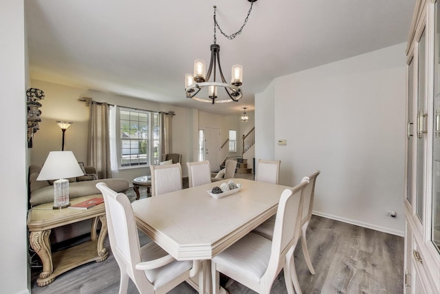 1400 Patrick Dr, Mundelein, IL 60060 - dining space with a chandelier, light wood-style flooring, and baseboards