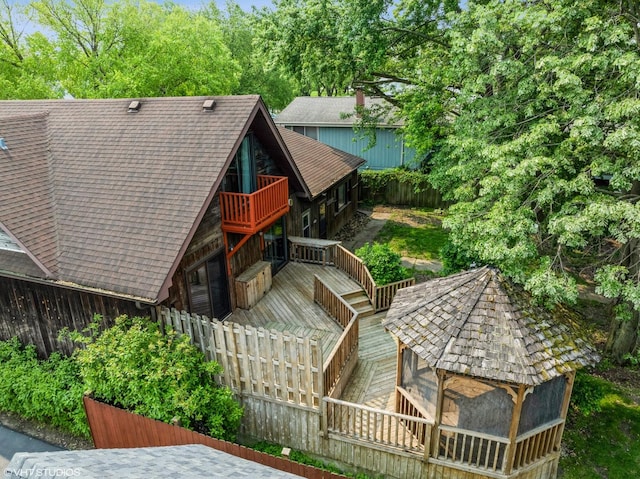 734 S Warren Ave, Palatine, IL 60074 - rear view of property featuring a deck and roof with shingles
