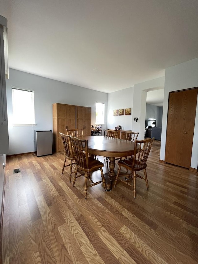 749 S Vintage Ln, Round Lake, IL 60073 - dining room featuring light wood-style flooring and plenty of natural light