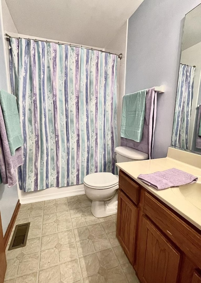 749 S Vintage Ln, Round Lake, IL 60073 - full bathroom featuring vanity, toilet, and tile patterned floors