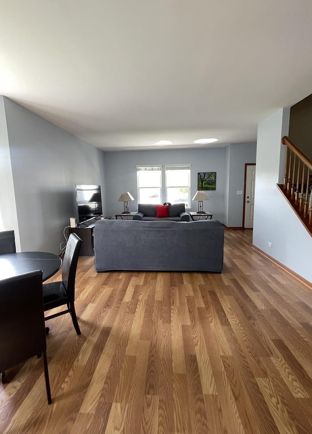 749 S Vintage Ln, Round Lake, IL 60073 - living area featuring light wood-type flooring and stairway