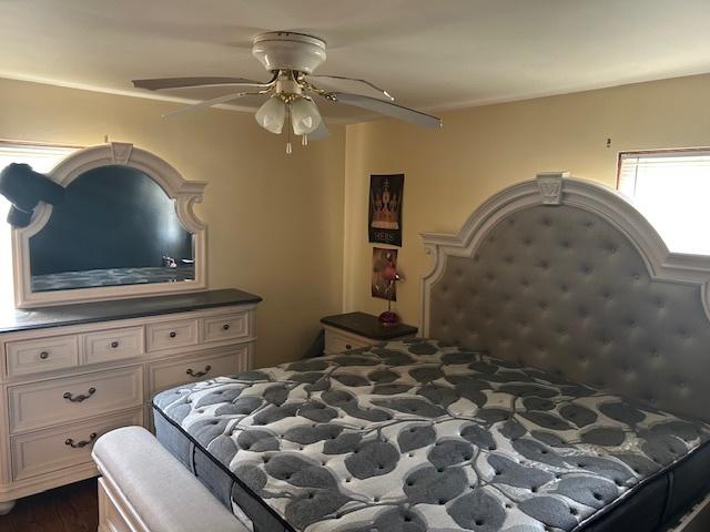 746 May St, Calumet City, IL 60409 - bedroom featuring dark wood-style floors and a ceiling fan