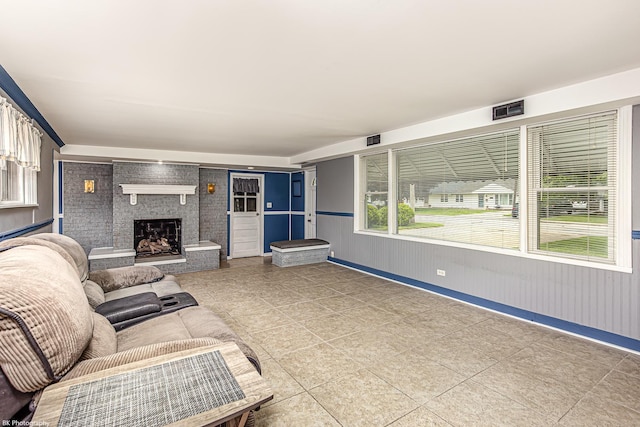4243 W 90th Pl, Hometown, IL 60456 - living room with tile patterned floors, a fireplace, and baseboards