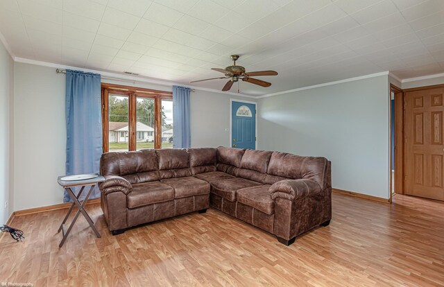 4243 W 90th Pl, Hometown, IL 60456 - living room featuring ornamental molding, light wood-style flooring, baseboards, and ceiling fan