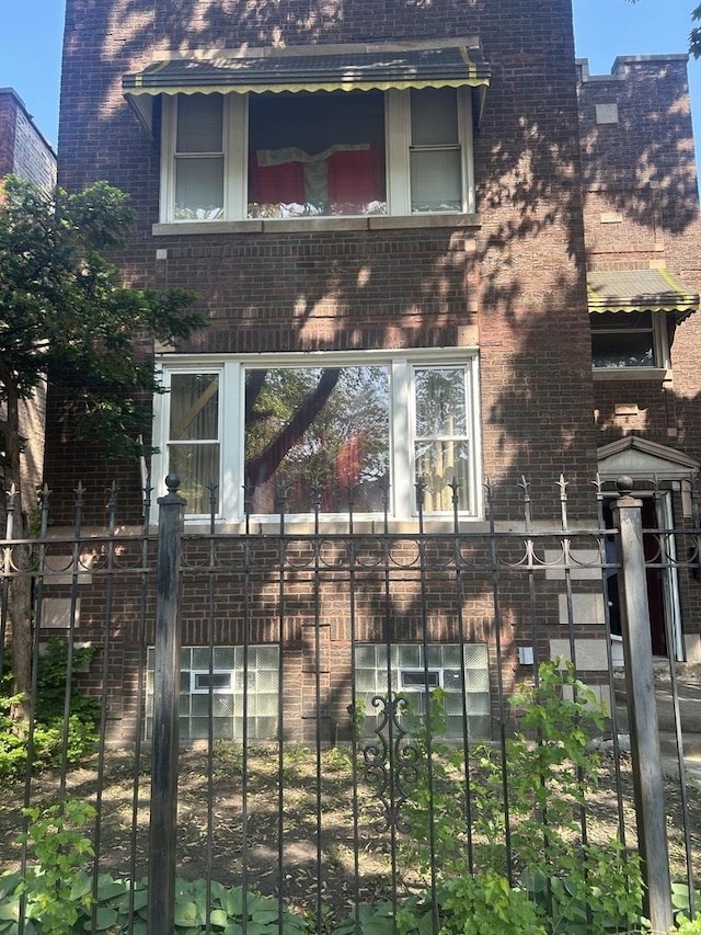 8039 S Ingleside Ave, Chicago, IL 60619 - view of home's exterior featuring brick siding
