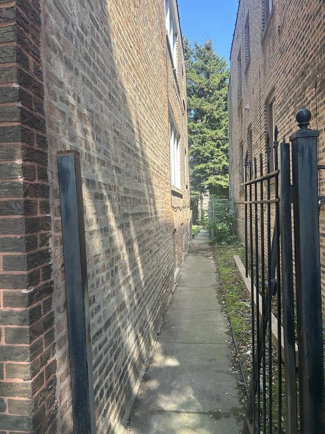 8039 S Ingleside Ave, Chicago, IL 60619 - view of side of property featuring brick siding