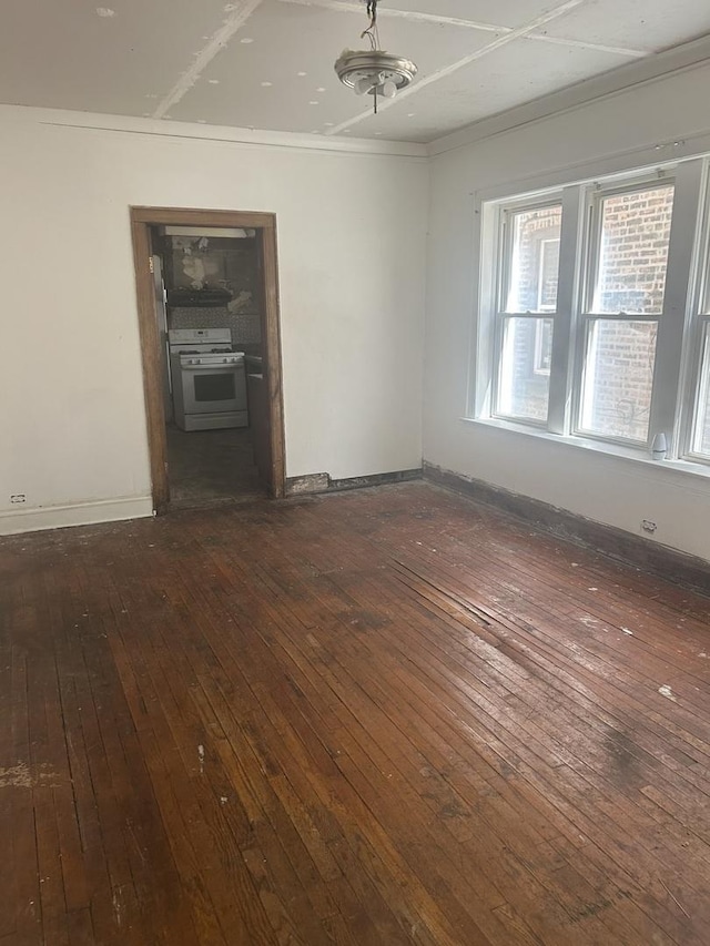 8039 S Ingleside Ave, Chicago, IL 60619 - empty room featuring dark wood finished floors and ornamental molding