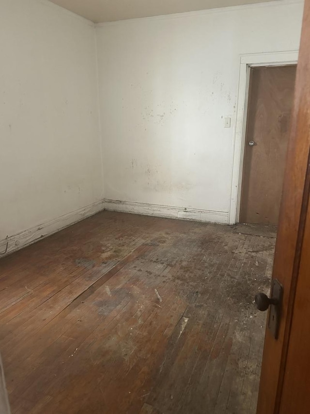 8039 S Ingleside Ave, Chicago, IL 60619 - empty room with dark wood finished floors