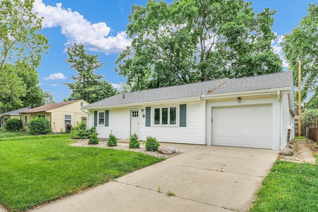 713 E Michigan Ave, Urbana, IL 61801 - ranch-style house with an attached garage, a front lawn, and concrete driveway