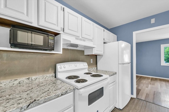 713 E Michigan Ave, Urbana, IL 61801 - kitchen featuring white appliances, under cabinet range hood, white cabinetry, backsplash, and light wood finished floors