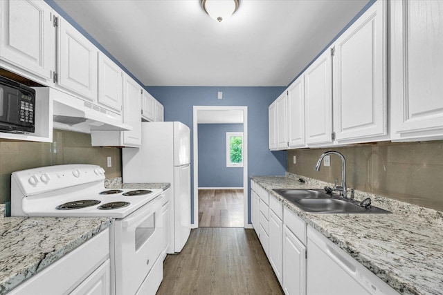 713 E Michigan Ave, Urbana, IL 61801 - kitchen with white appliances, a sink, white cabinets, and light countertops