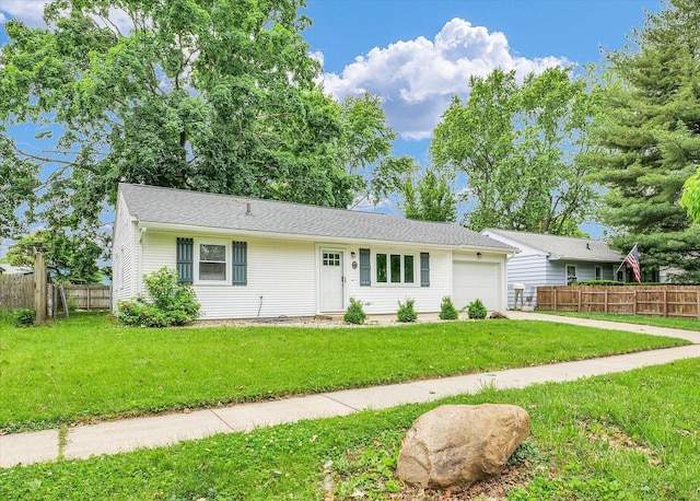 713 E Michigan Ave, Urbana, IL 61801 - ranch-style house with a garage and concrete driveway