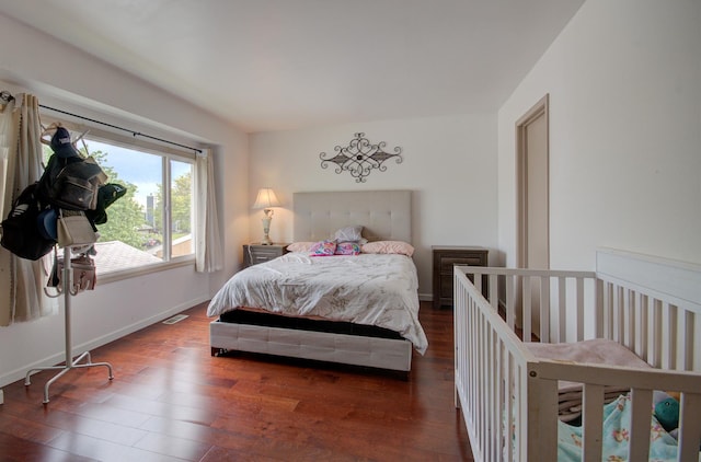 649 Sundance Dr, Bolingbrook, IL 60440 - bedroom with wood finished floors and baseboards
