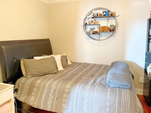 4950 N Western Ave Unit Ph2, Chicago, IL 60625 - bedroom with crown molding, wood finished floors, and baseboards