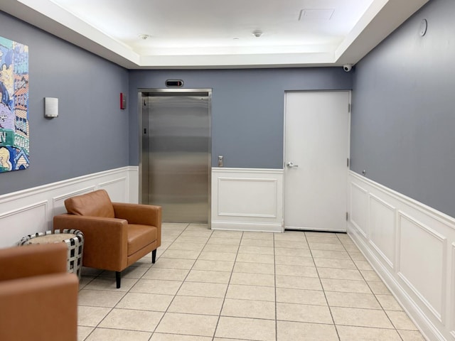 4950 N Western Ave Unit Ph2, Chicago, IL 60625 - community lobby featuring a wainscoted wall, a decorative wall, and a security system