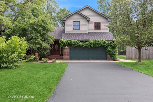 4335 Dewey Ave, Matteson, IL 60443 - view of front of house featuring asphalt driveway, an attached garage, a shingled roof, and brick siding