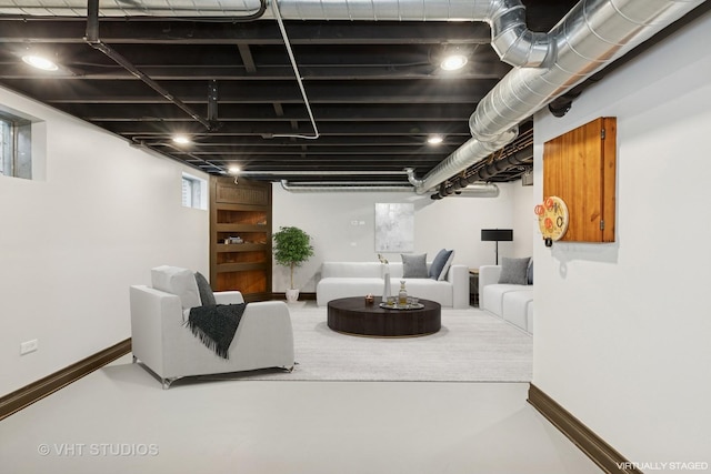 4335 Dewey Ave, Matteson, IL 60443 - living area with finished concrete flooring and baseboards