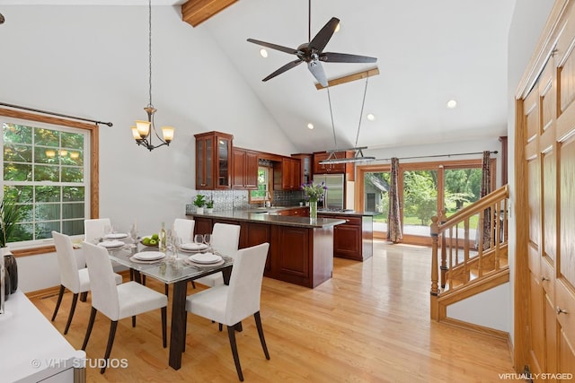4335 Dewey Ave, Matteson, IL 60443 - dining room featuring high vaulted ceiling, beamed ceiling, light wood-style flooring, stairway, and a ceiling fan