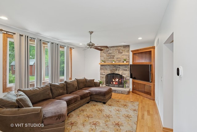 4335 Dewey Ave, Matteson, IL 60443 - living room featuring a ceiling fan, light wood-style floors, a fireplace, and recessed lighting