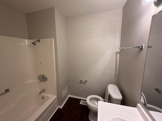 5911 Timberlane Rd, Matteson, IL 60443 - bathroom with toilet, wood finished floors,  shower combination, vanity, and baseboards