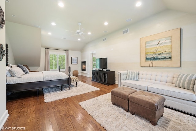 26874 N Countryside Lake Dr, Mundelein, IL 60060 - bedroom featuring lofted ceiling, wood finished floors, recessed lighting, and ceiling fan