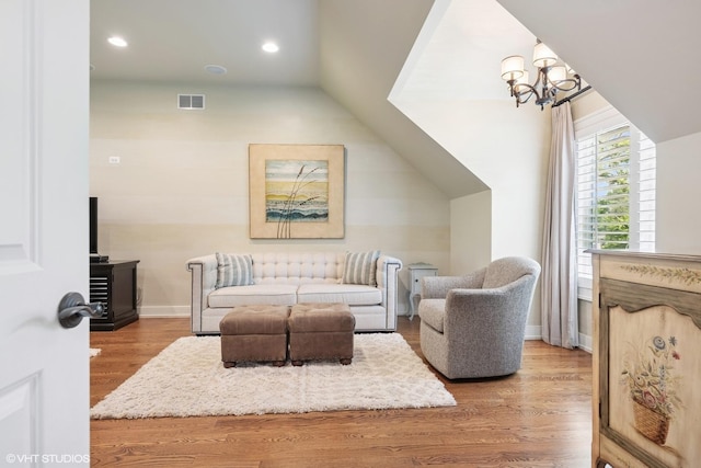 26874 N Countryside Lake Dr, Mundelein, IL 60060 - living room with a chandelier, wood finished floors, lofted ceiling, recessed lighting, and baseboards