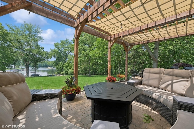 26874 N Countryside Lake Dr, Mundelein, IL 60060 - view of patio / terrace featuring an outdoor living space with a fire pit, a water view, a pergola, and view of wooded area