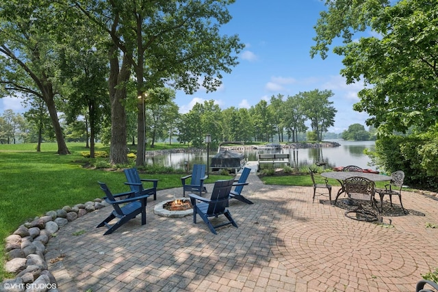 26874 N Countryside Lake Dr, Mundelein, IL 60060 - view of patio / terrace with a fire pit and a water view