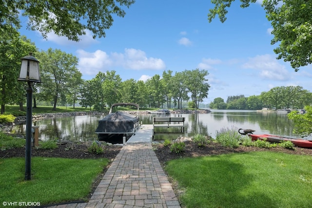 26874 N Countryside Lake Dr, Mundelein, IL 60060 - dock area featuring a water view and a yard