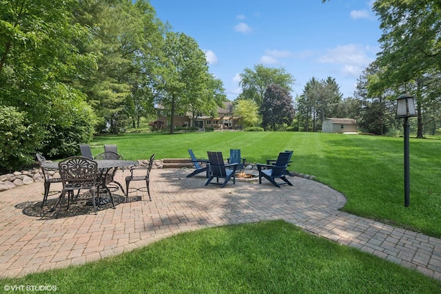 26874 N Countryside Lake Dr, Mundelein, IL 60060 - view of patio / terrace featuring outdoor dining space and a fire pit