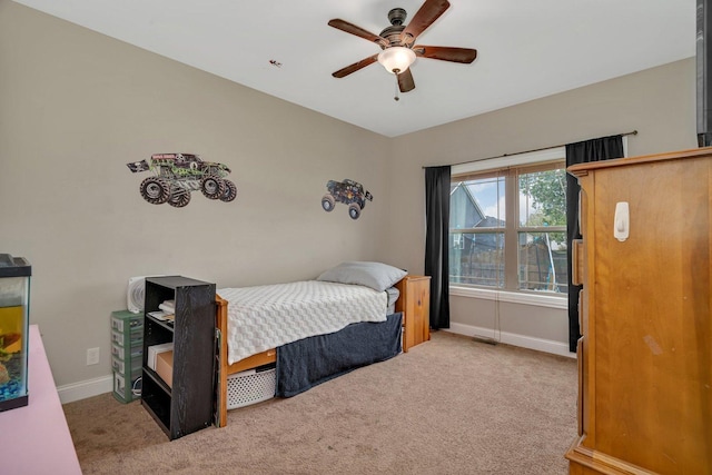 1200 Farmstone Dr, Diamond, IL 60416 - carpeted bedroom with baseboards and a ceiling fan