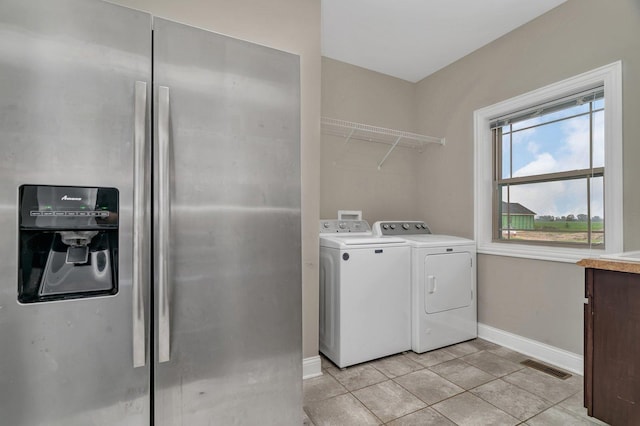 1200 Farmstone Dr, Diamond, IL 60416 - washroom featuring baseboards, separate washer and dryer, and light tile patterned floors