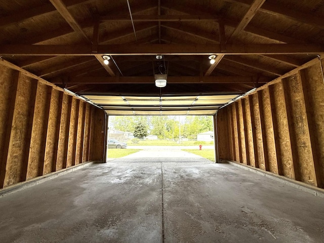 424 E Clark St, Glenwood, IL 60425 - garage featuring a garage door opener