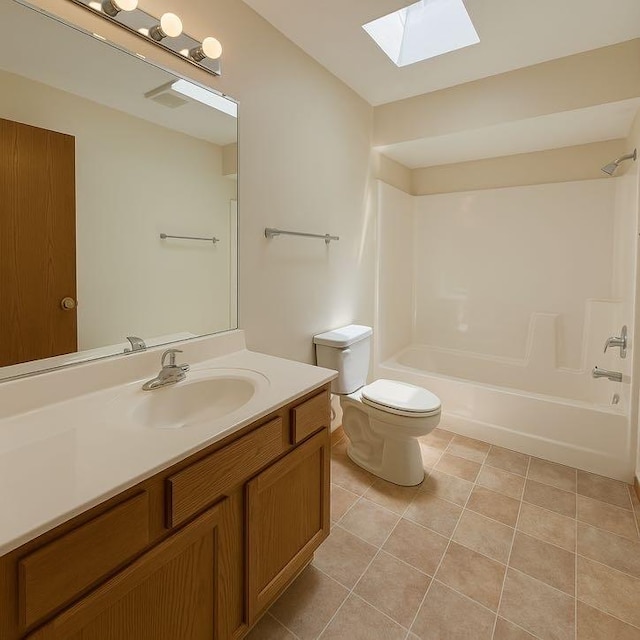 424 E Clark St, Glenwood, IL 60425 - bathroom featuring a skylight, vanity, tile patterned flooring, toilet, and shower / bath combination