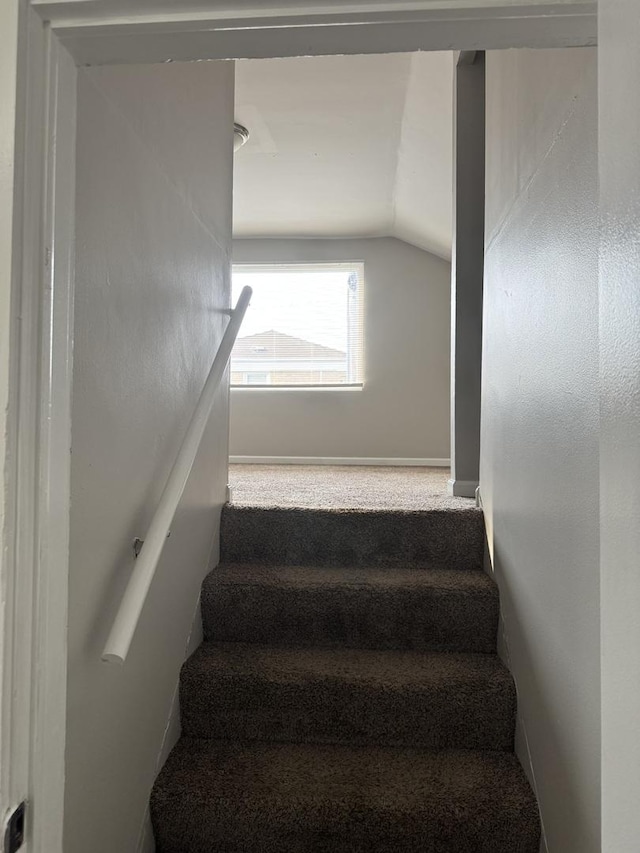 2219 S 13th Ave, Broadview, IL 60155 - staircase featuring lofted ceiling, baseboards, and carpet floors