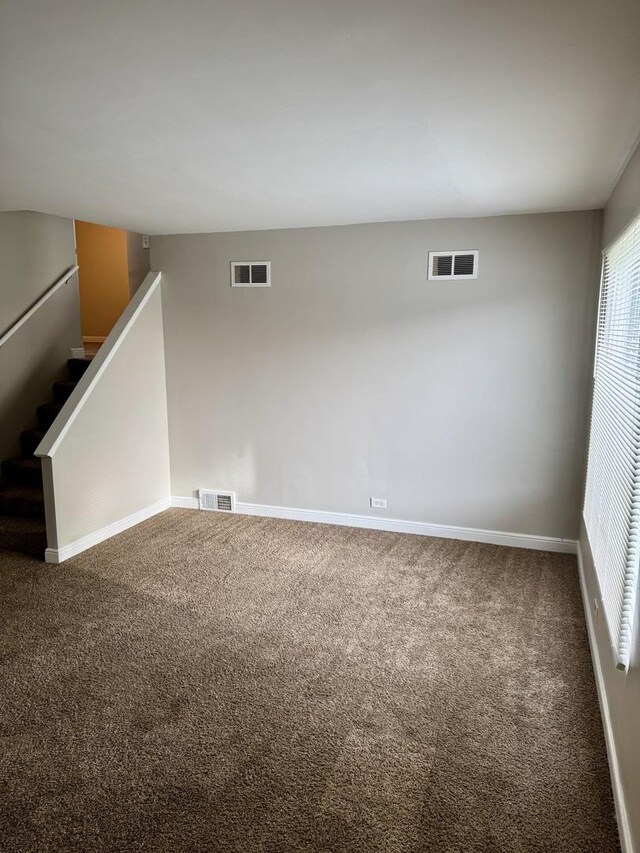 2219 S 13th Ave, Broadview, IL 60155 - unfurnished room featuring carpet floors, baseboards, and stairs
