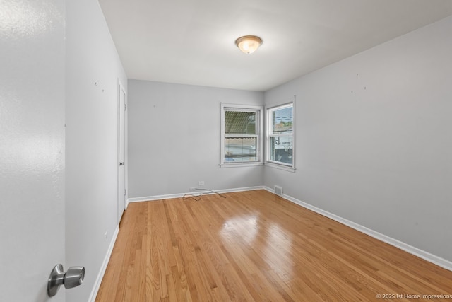 2312 S 1st Ave, North Riverside, IL 60546 - spare room featuring baseboards and light wood-style floors