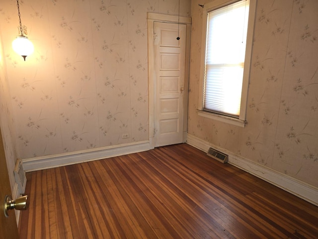 3905 N Oak Park Ave, Chicago, IL 60634 - unfurnished room featuring wood finished floors and baseboards