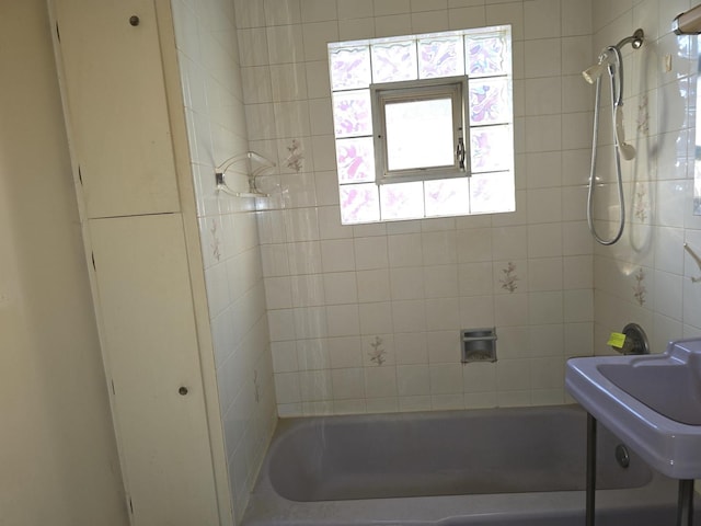 3905 N Oak Park Ave, Chicago, IL 60634 - bathroom with washtub / shower combination, plenty of natural light, and a sink