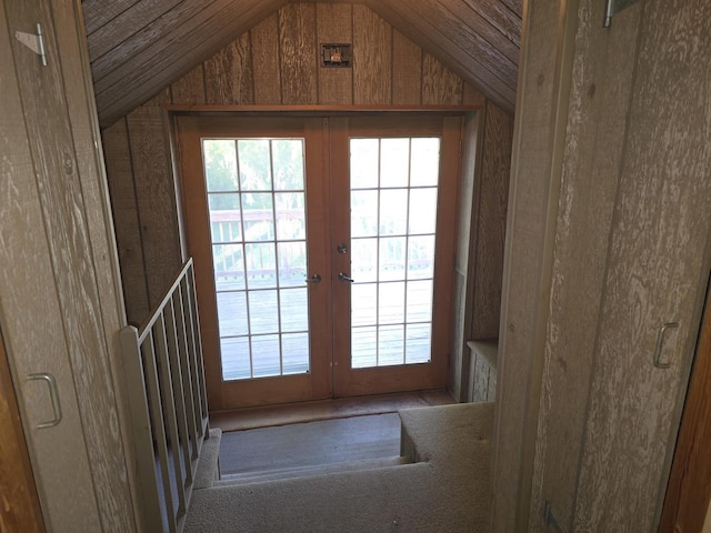 3905 N Oak Park Ave, Chicago, IL 60634 - doorway featuring french doors, vaulted ceiling, and carpet