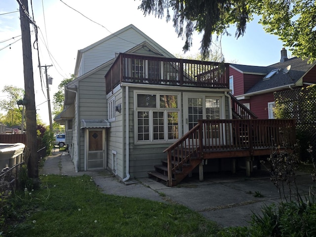 3905 N Oak Park Ave, Chicago, IL 60634 - back of house with a balcony and stairway