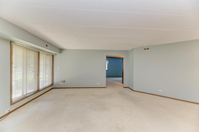 464 S President St Unit 101, Carol Stream, IL 60188 - spare room featuring carpet floors and baseboards